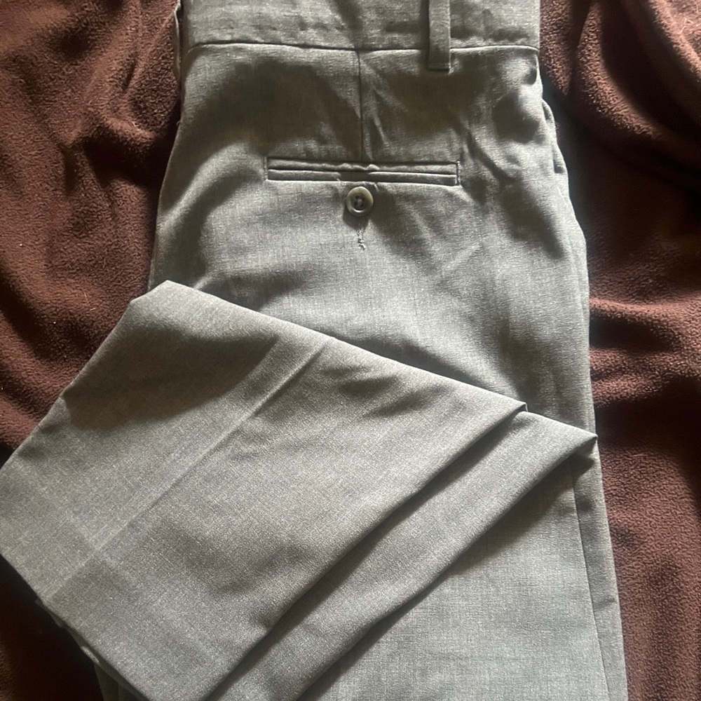 Boys size 18 husky Calvin Klein grey dress pants. Excellent condition.